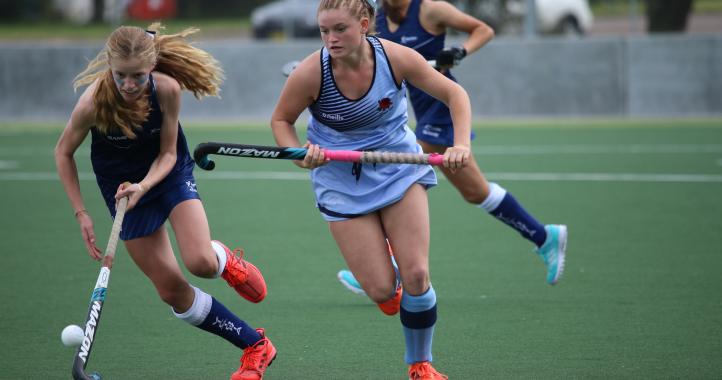 Girl Playing Hockey