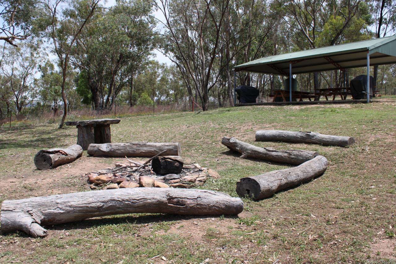 Self-contained campfire and BBQ area