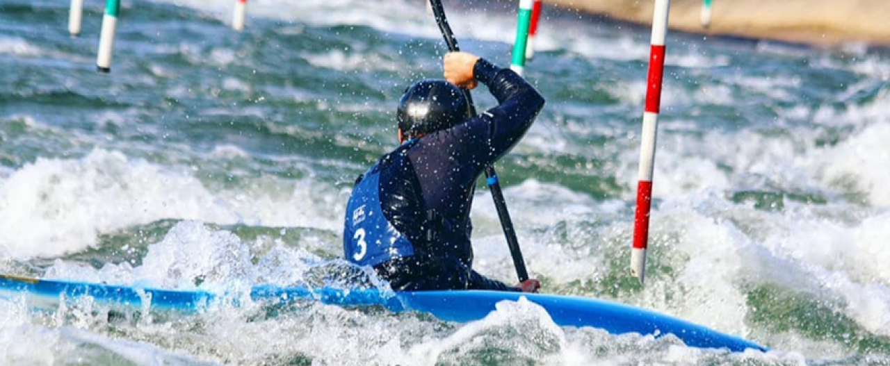 Person doing whitewater slalom training