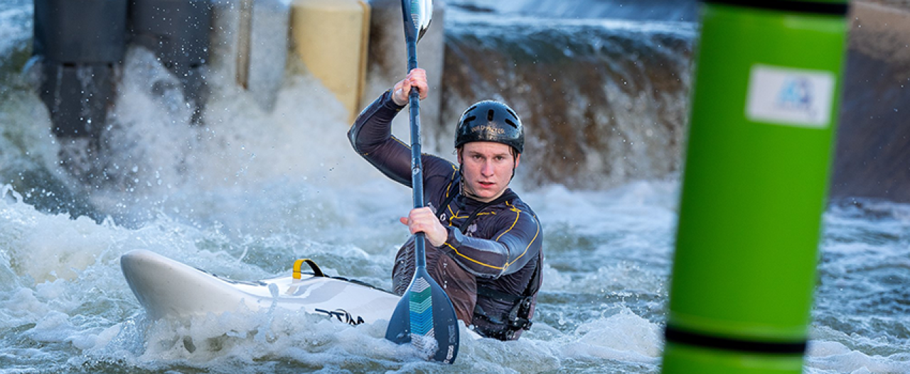 Person doing whitewater slalom training