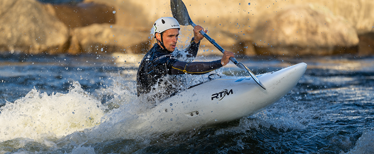 Person doing whitewater slalom training