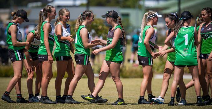 Girls lining up for AFL